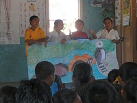 rewa children with wildlife drawing